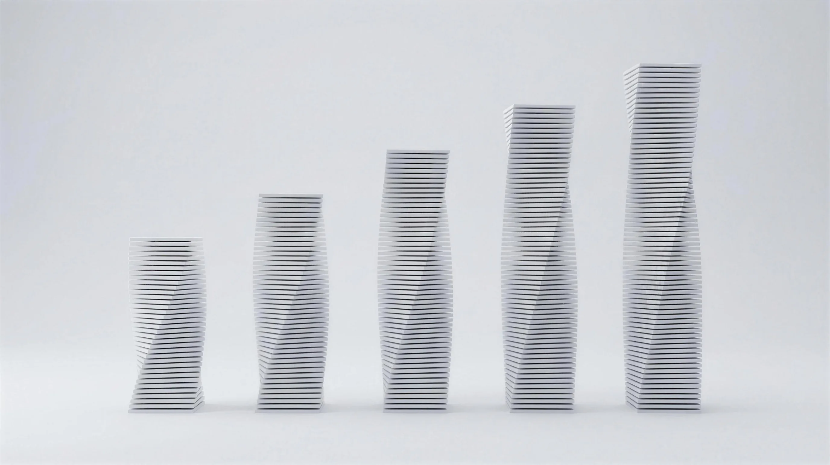 Five towers of stacked white plates arranged in ascending height order